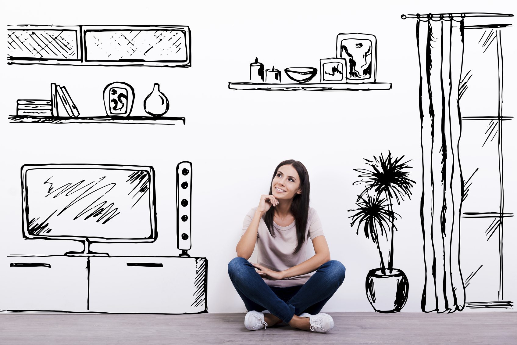 Cheerful young woman smiling while sitting on the floor against white background with drawn home interior